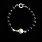 The Black Bracelet